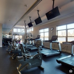 fitness center with exercise equipment