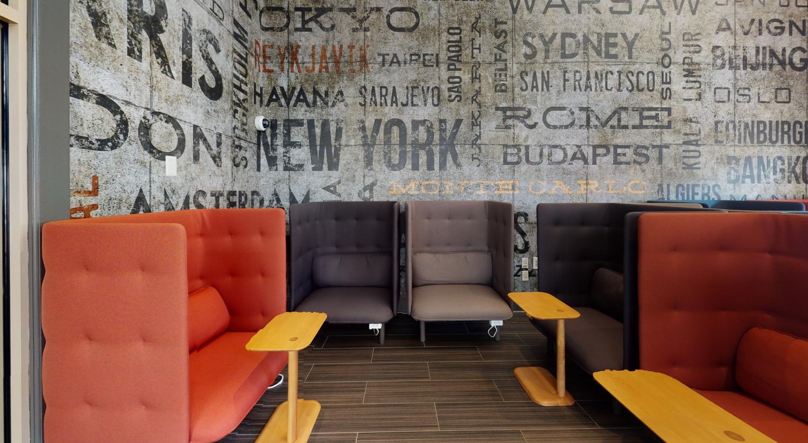 Take advantage of all Riverbend at Port Imperial has to offer a room with chairs and a table