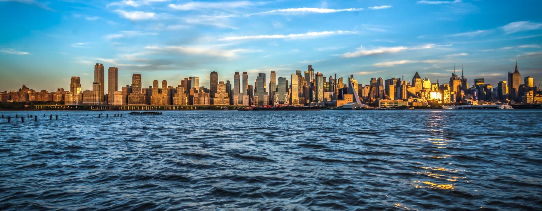 a city skyline across the water