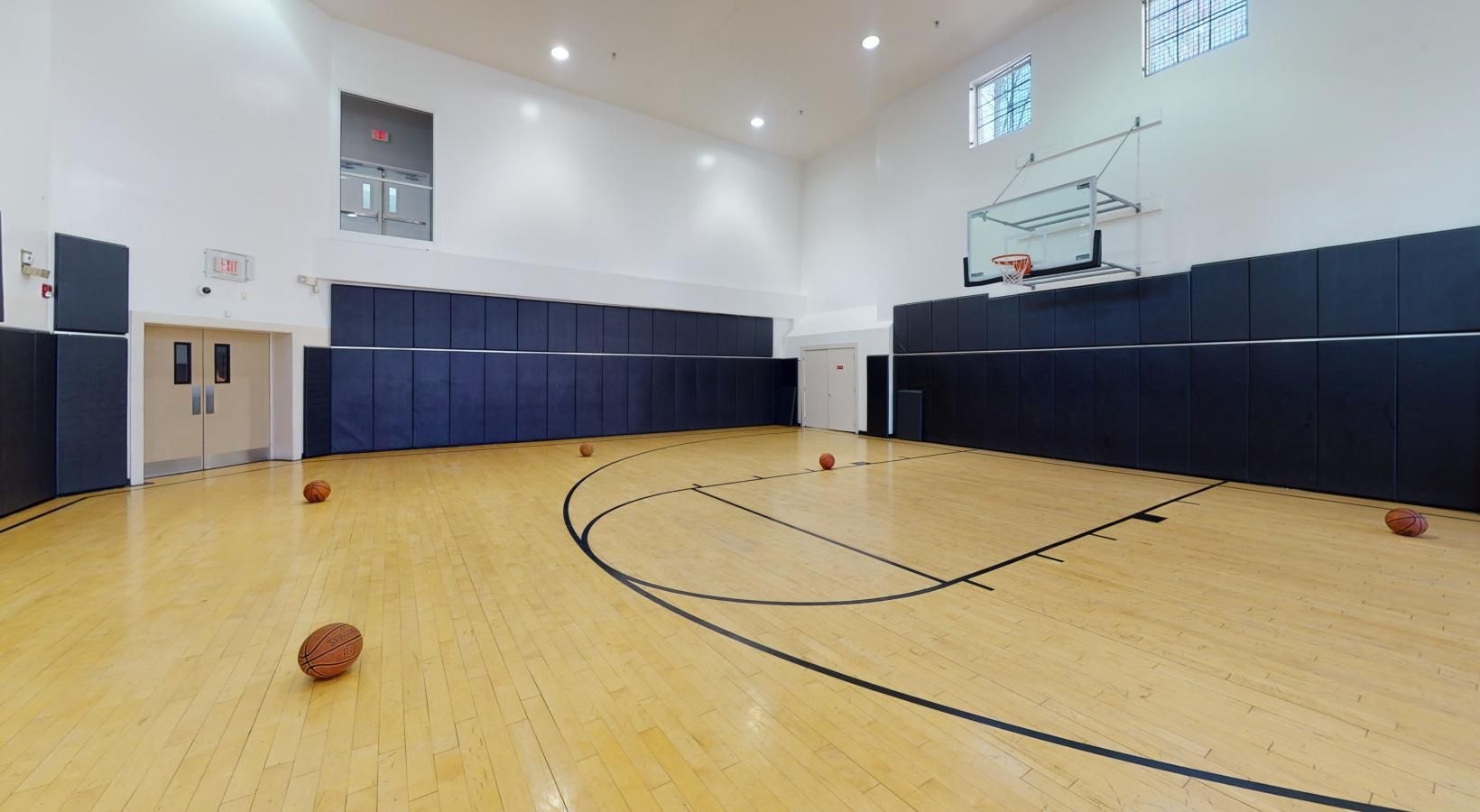 Find your perfect fit at Riverbend at Port Imperial a basketball court with a net