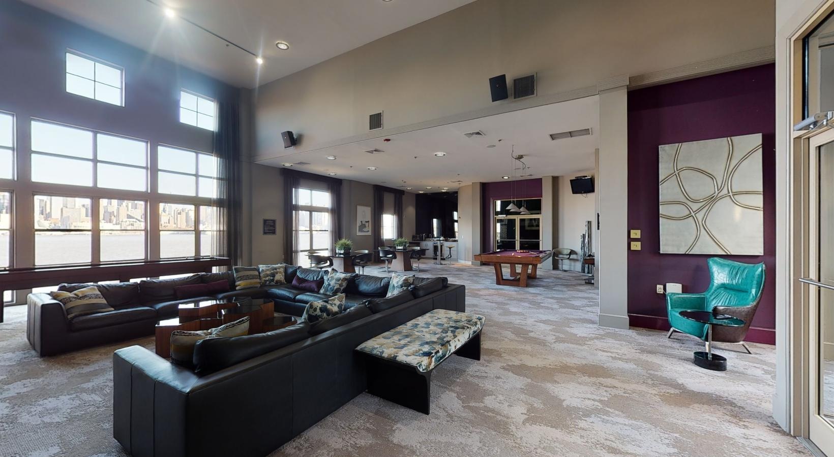 Enjoy our resident-only features a living room with a couch and a table