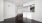 a kitchen with white cabinets
