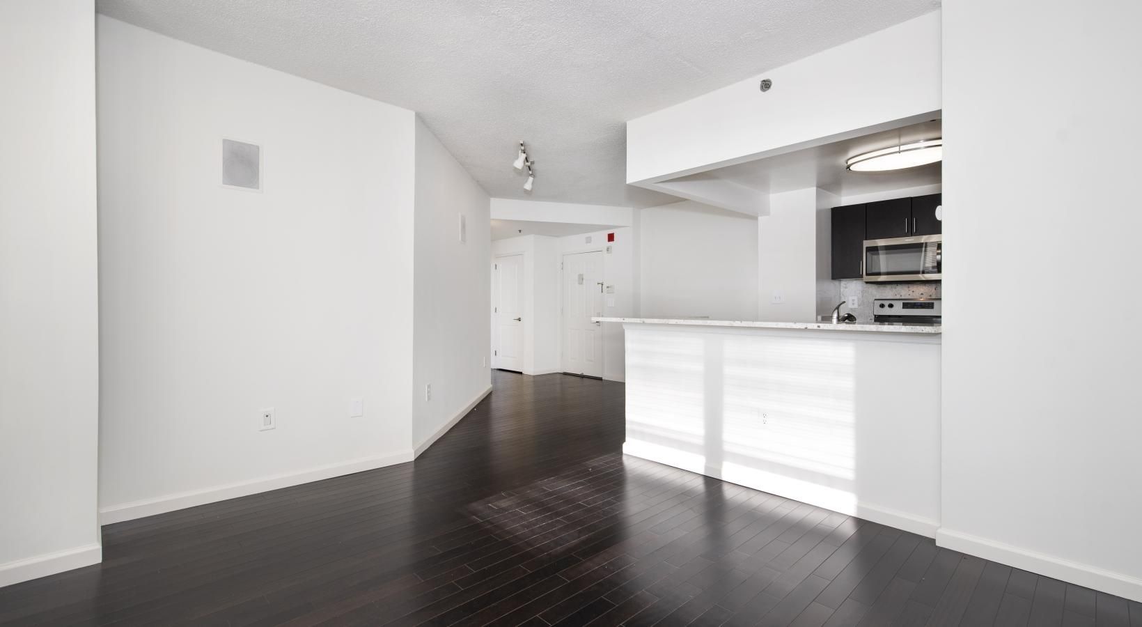 Find your perfect fit at Riverbend at Port Imperial a kitchen with white cabinets