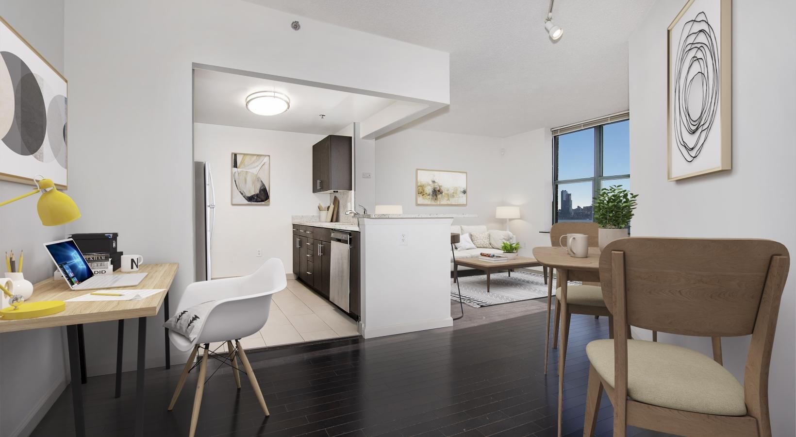 Wide open living areas perfect for entertaining a room with a table chairs and a laptop