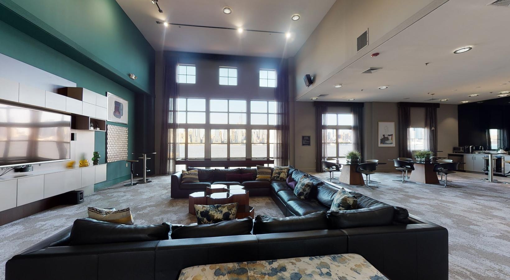 Access to resident-only features a large living room with a large window